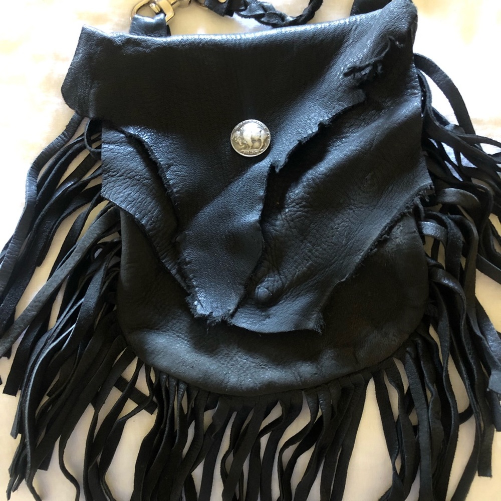 Vintage handmade leather fringe purse